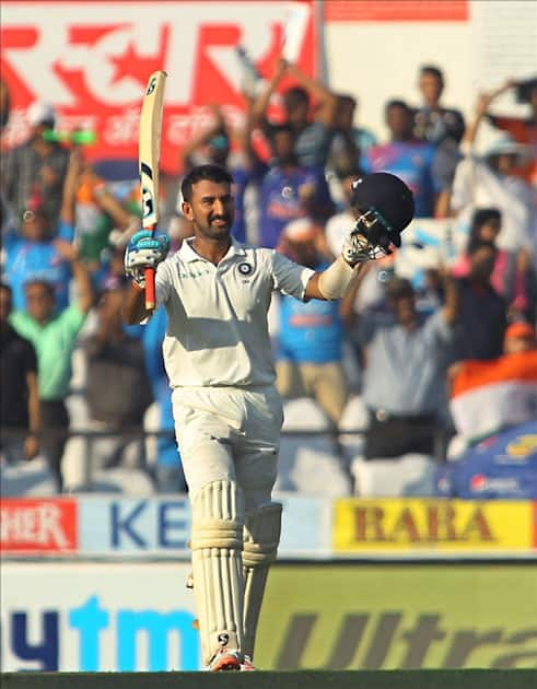 Cheteshwar Pujara of India celebrates his century on Day 2 of the second test match between India and Sri Lanka at Vidarbha Cricket Association Stadium in Nagpur.