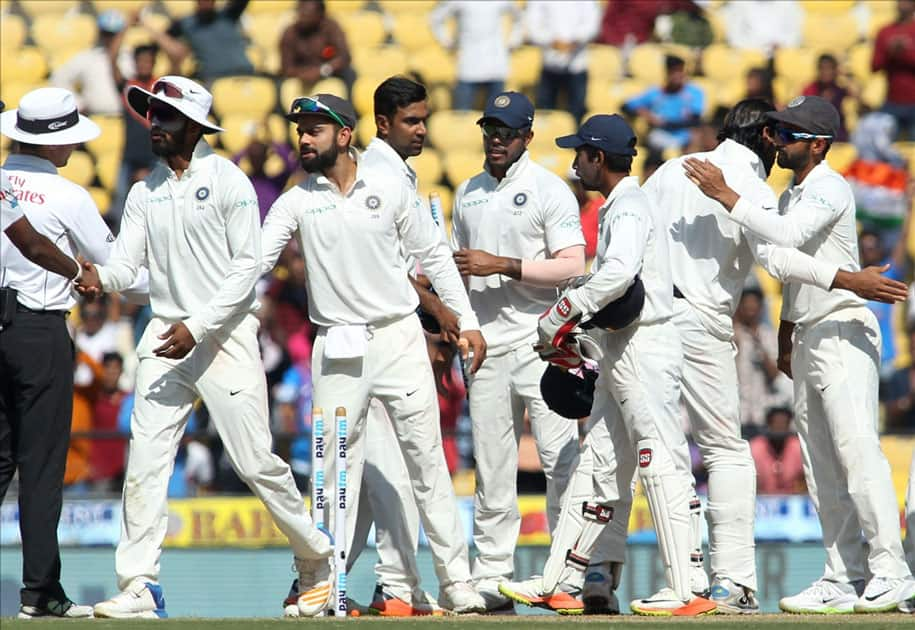 Indian skipper Virat Kohli celebrates with teammates after winning the second test match against Sri Lanka at Vidarbha Cricket Association Stadium in Nagpur.