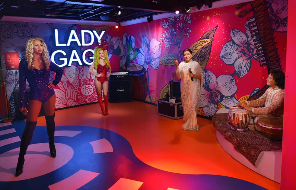 Wax figures of Asha Bhosle, Zakir Hussain and Lady Gaga displayed at Madame Tussauds Wax Museum, during a press preview in New Delhi.
