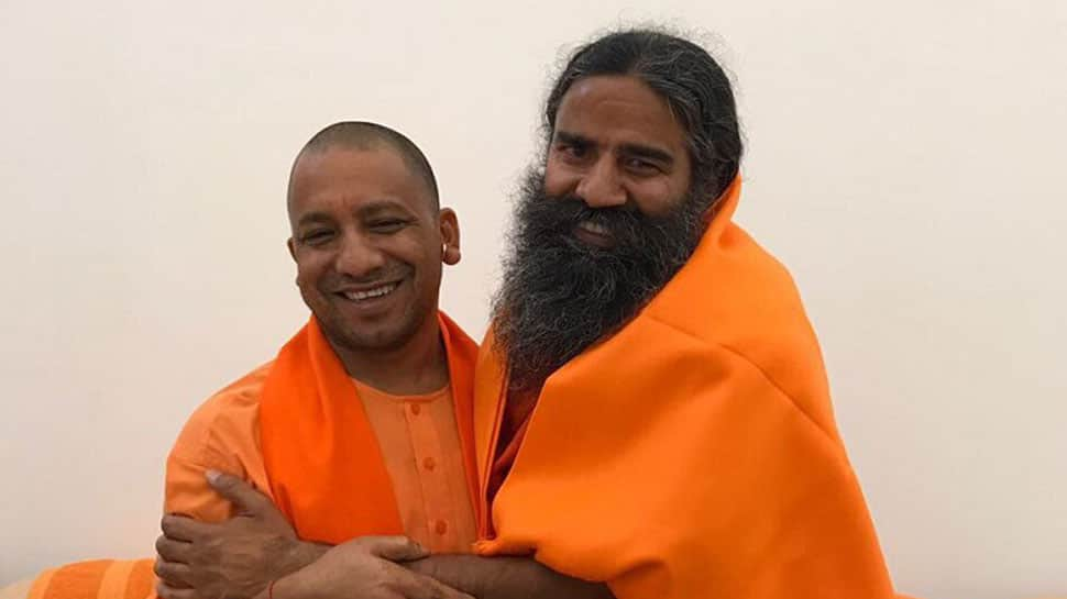 Ramdev meets Adityanath, discuss investment and Noida land scam