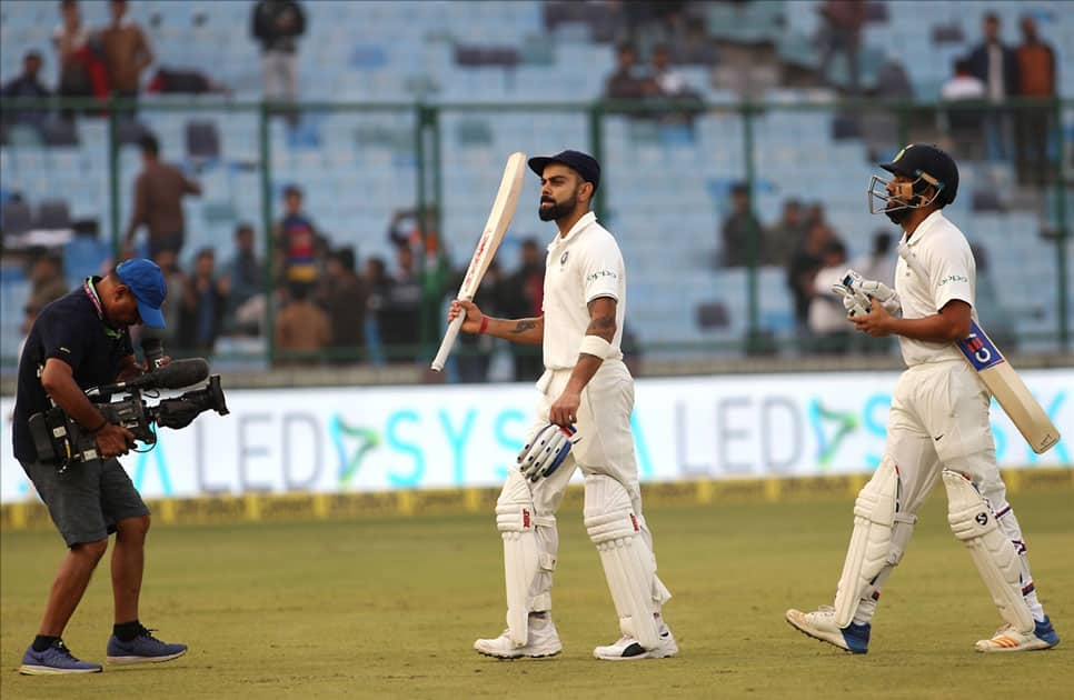 India's Virat Kohli and Rohit Sharma during Day 1 of the third test match between India and Sri Lanka at Feroz Shah Kotla Stadium in New Delhi.