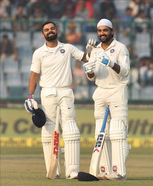 India's Murali Vijay and Virat Kohli during Day 1 of the third test match between India and Sri Lanka at Feroz Shah Kotla Stadium in New Delhi.