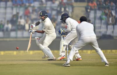 Indian batsman Shikhar Dhawan plays a shot during the third cricket test match against Sri Lanka at Feroz Shah Kotla, in New Delhi.