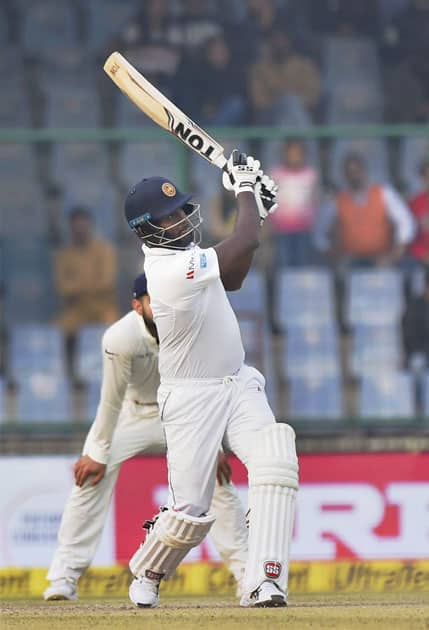 Sri Lanka's Angelo Mathews plays a shot during the second day of the third cricket test match against India at Feroz Shah Kotla, in New Delhi.