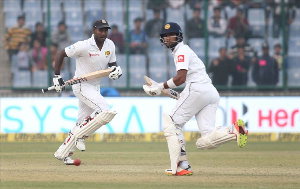 Sri Lanka's Angelo Mathews and Dinesh Chandimal in action on Day 2 of the third test match between India and Sri Lanka at Feroz Shah Kotla Stadium in New Delhi.