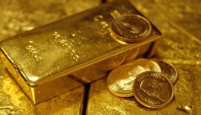 Gold price hits four-month low as firmer dollar sparks range break