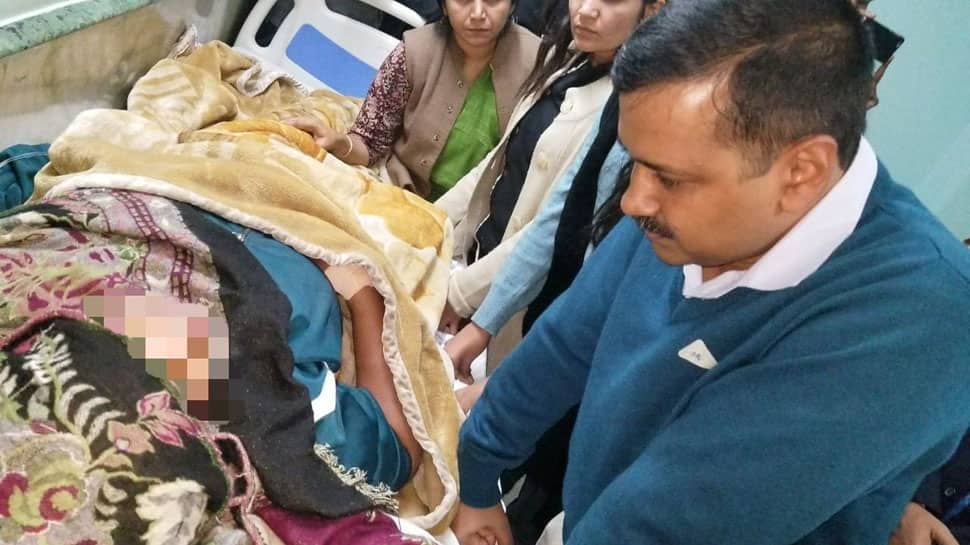 Arvind Kejriwal meets woman beaten for helping bust liquor racket