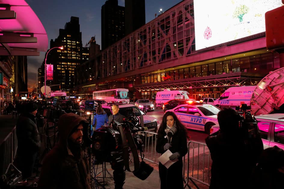 Members of the media gather by the New York Port Authority bus terminal following an attempted detonation during the morning rush hour in New York City. Members of the media gather by the New York Port Authority bus terminal following an attempted detonation during the morning rush hour in New York City.