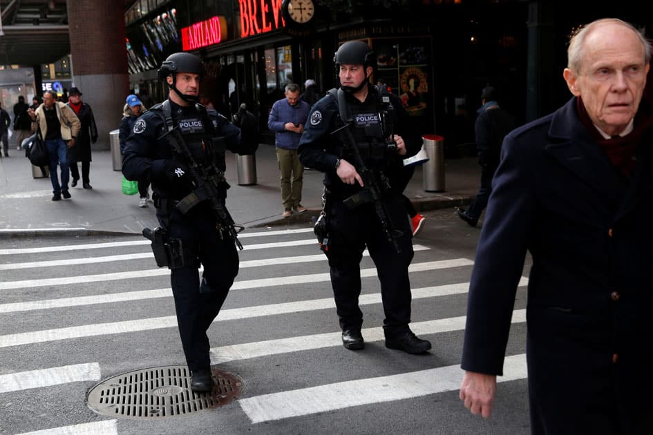 Members of the Port Authority Police Counter Terrorism Unit patrol the area outside the New York Port Authority Bus Terminal following an attempted detonation during the morning rush hour, in New York City. Members of the Port Authority Police Counter Terrorism Unit patrol the area outside the New York Port Authority Bus Terminal following an attempted detonation during the morning rush hour, in New York City.