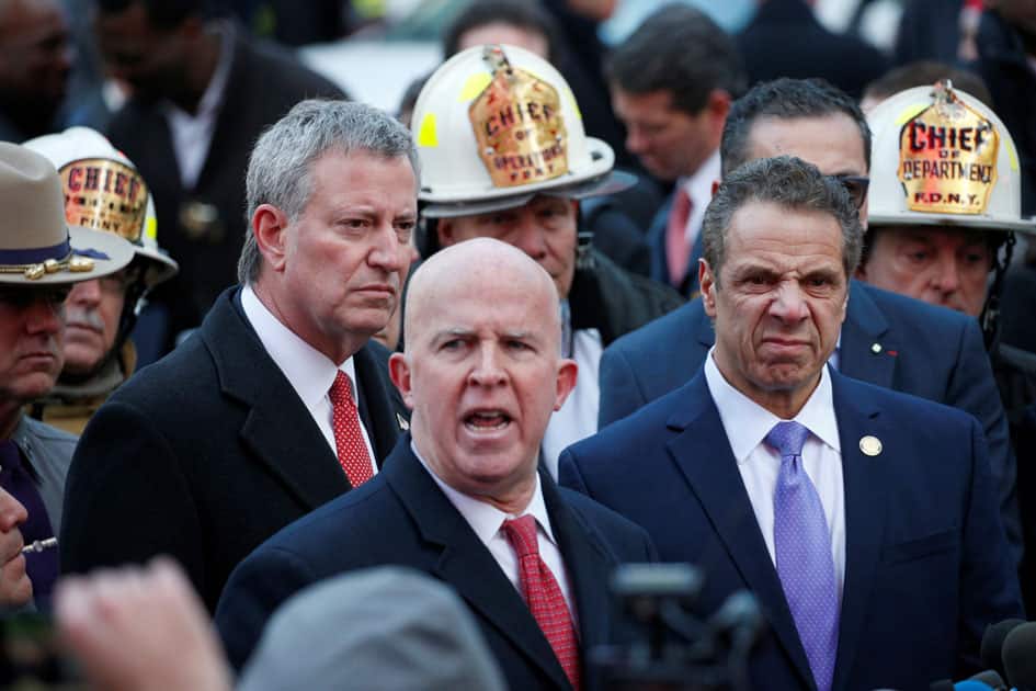 Mayor Bill de Blasio and Governor Andrew Cuomo look on as New York City Police Commissioner James O''Neill speaks during a news conference outside the New York Port Authority Bus Terminal following reports of an explosion, in New York City. Mayor Bill de Blasio and Governor Andrew Cuomo look on as New York City Police Commissioner James O''Neill speaks during a news conference outside the New York Port Authority Bus Terminal following reports of an explosion, in New York City.