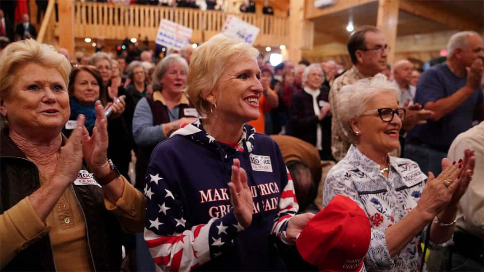 Voters head to polls in Alabama race with high stakes for Trump