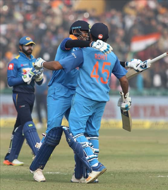 Indian captain Rohit Sharma celebrates his third ODI double century during the second One Day International (ODI) match between India and Sri Lanka at Punjab Cricket Association IS Bindra Stadium in Mohali.