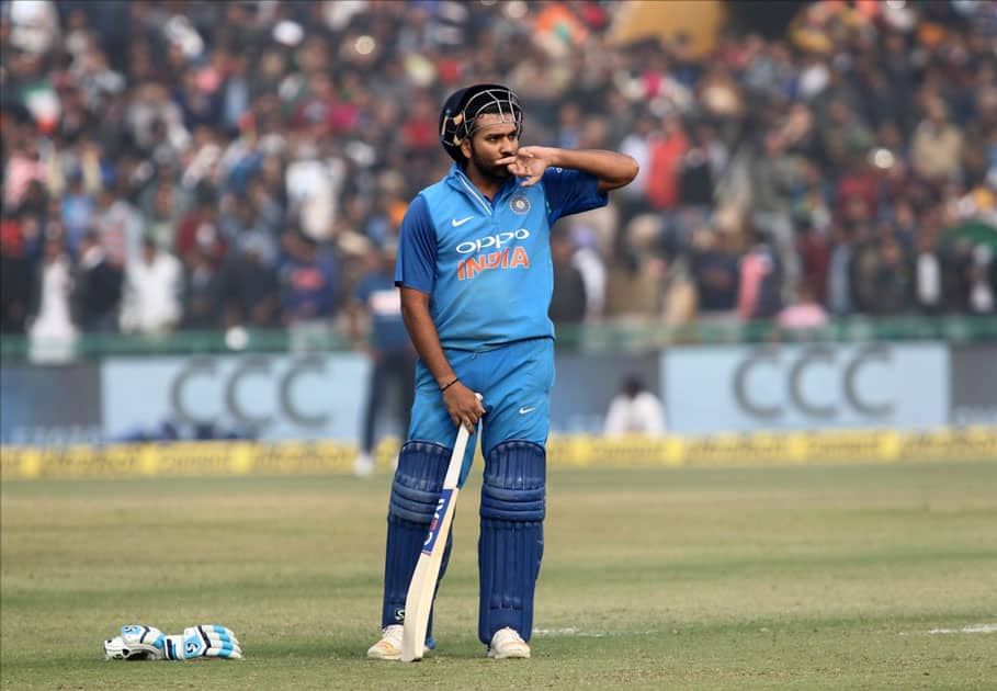 Indian captain Rohit Sharma celebrates his third ODI double century during the second One Day International (ODI) match between India and Sri Lanka at Punjab Cricket Association IS Bindra Stadium in Mohali.