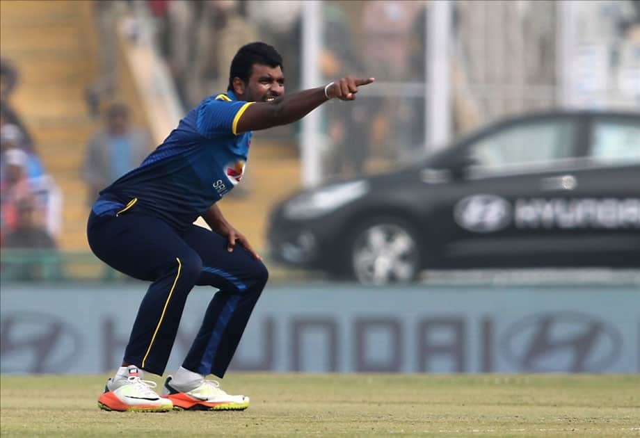 Sri Lankan captain Thisara Perera appeals unsuccessfully for a wicket of India's Shikhar Dhawan during the 2nd One Day International (ODI) match between India and Sri Lanka at Punjab Cricket Association IS Bindra Stadium in Mohali.