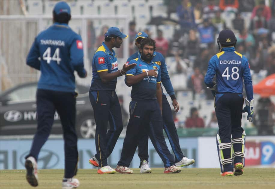 Sri Lanka's Sachith Pathirana celebrates fall of a wicket of India's Shikhar Dhawan during the 2nd One Day International (ODI) match between India and Sri Lanka at Punjab Cricket Association IS Bindra Stadium in Mohali.