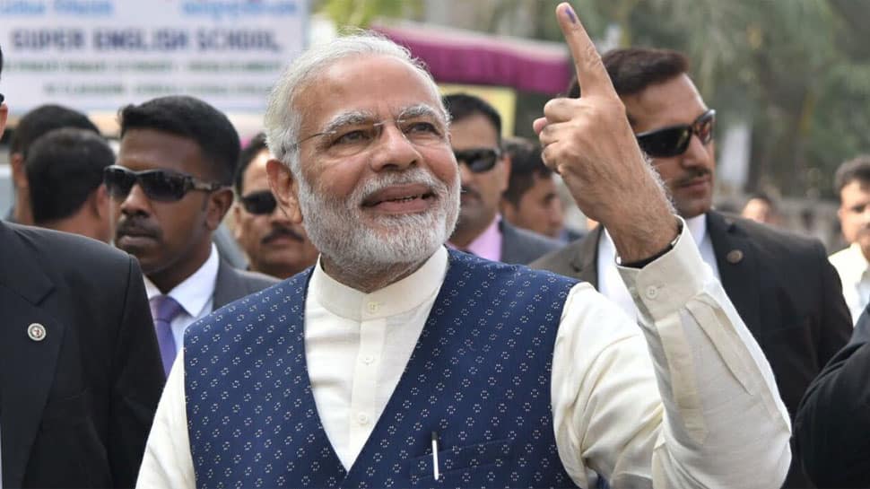 Watch: PM Modi waits in queue, casts vote in Ahmedabad for Gujarat Assembly elections