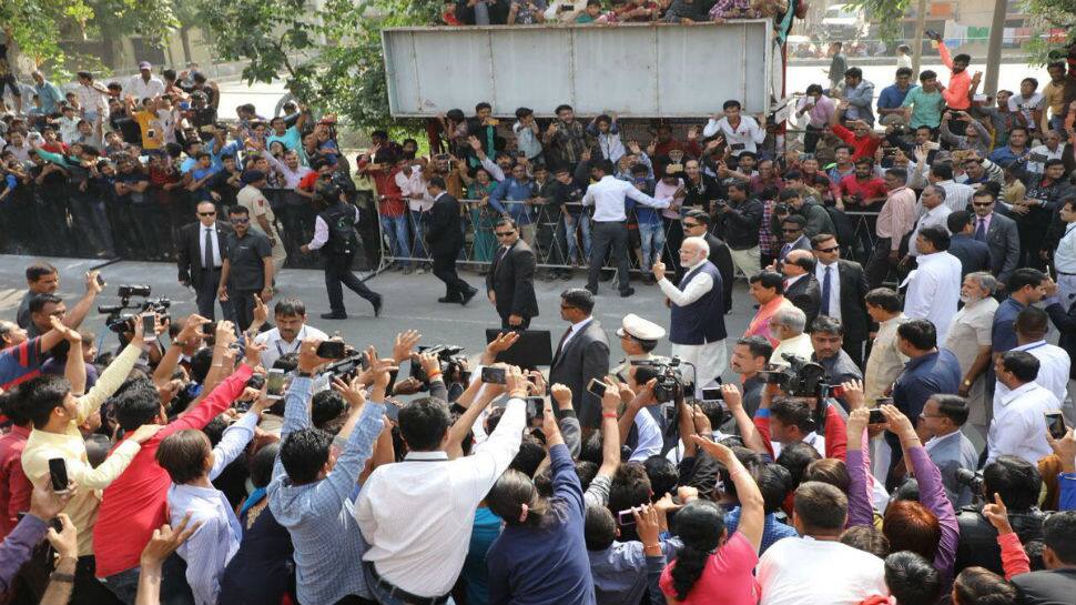 Modi, after arriving at the polling booth set up in Nishan High School of Ranip area, which is part of Sabarmati constituency, also bowed to greet his elder brother Somabhai Modi who was present there