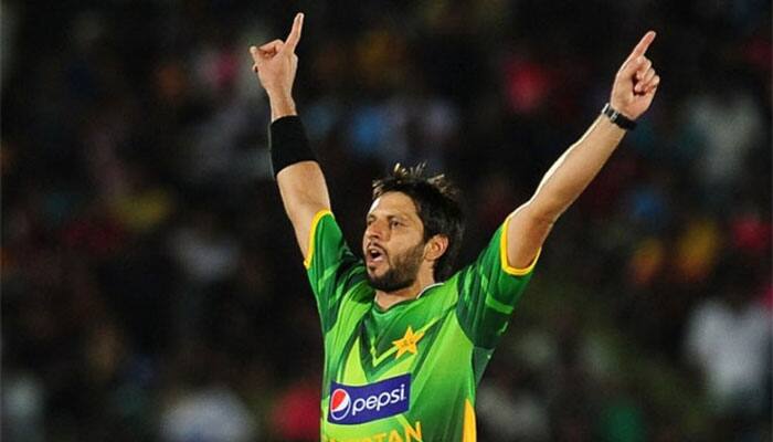 Shahid Afridi&#039;s first three balls in T10 result in a hat-trick, including the wicket of Virender Sehwag