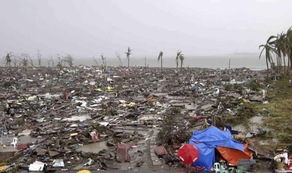 Landslides triggered by tropical storm Kai-Tak leaves 26 dead in central Philippines