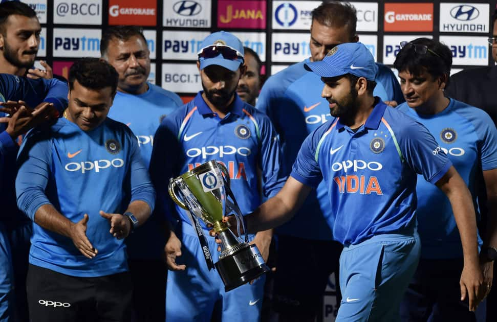 Indian team captian Rohit Sharma with the trophy after winning the 3rd and final ODI match against Sri Lanka in Vizag.