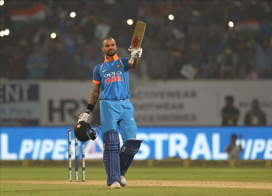 Shikhar Dhawan of India celebrates his century during the third ODI between India and Sri Lanka at Dr. Y.S. Rajasekhara Reddy ACA-VDCA Cricket Stadium in Visakhapatnam.