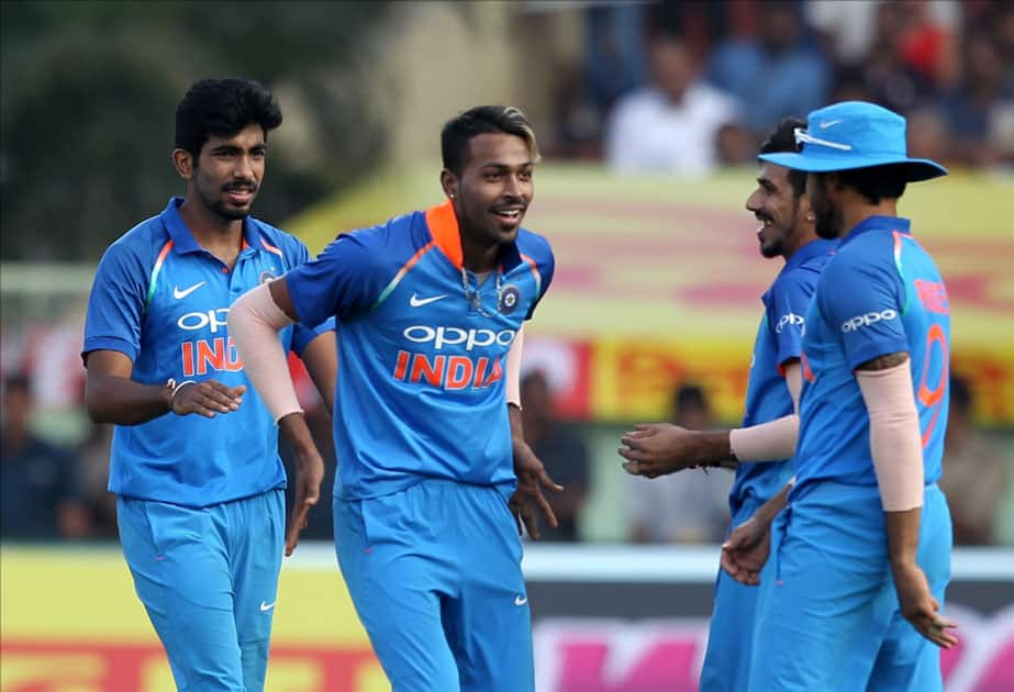 India's Hardik Pandya and Yuzvendra Chahal celebrate fall of a wicket of Sri Lanka''s Sachith Pathirana during the third ODI between India and Sri Lanka at Dr. Y.S. Rajasekhara Reddy ACA-VDCA Cricket Stadium in Visakhapatnam.