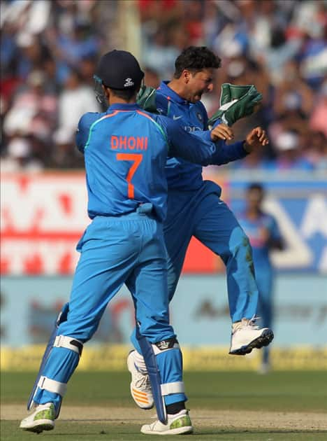 India's Kuldeep Yadav and M.S Dhoni celebrate fall of a wicket of Sri Lanka's Niroshan Dickwella during the third ODI between India and Sri Lanka at Dr. Y.S. Rajasekhara Reddy ACA-VDCA Cricket Stadium in Visakhapatnam.