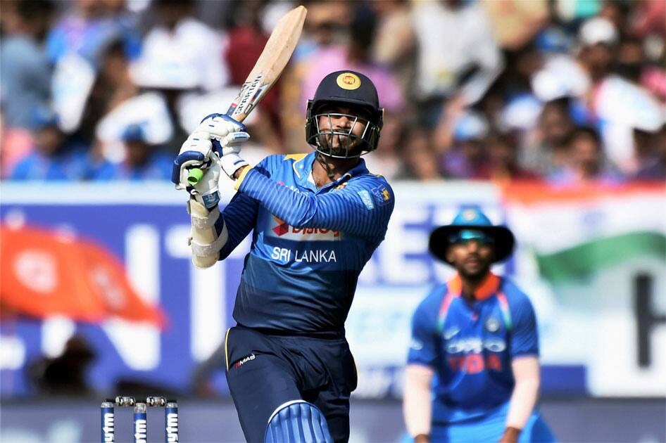 Sri Lankan player Upul Tharanga plays a shot during the 3rd and final ODI cricket match against India in Vizag.