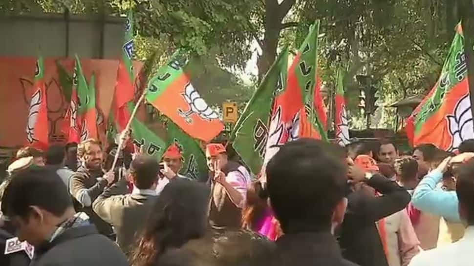 Assembly election 2017 results: BJP cadres across India celebrate as PM Modi flashes victory sign