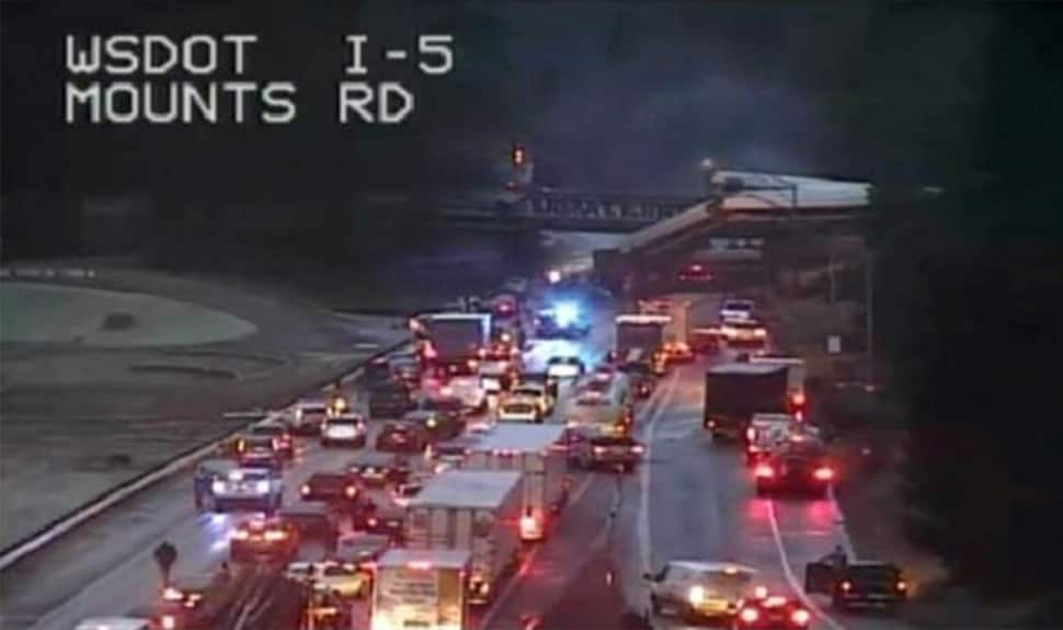 Train derails onto highway in Washington state, multiple killed