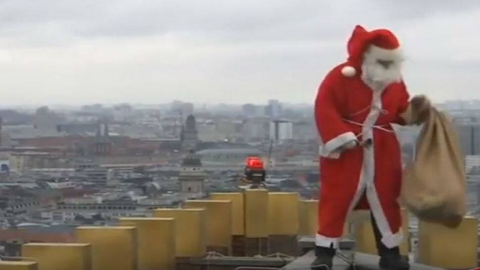 Watch: Santa Claus is now climbing skyscrapers to reach you with gifts