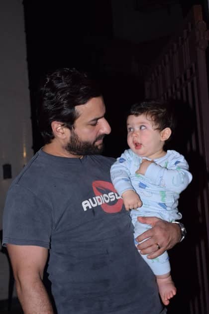 Actor Saif Ali Khan along with his son Taimur Ali Khan at Actress Soha Ali khan's residence on the occasion of her birthday in Mumbai.