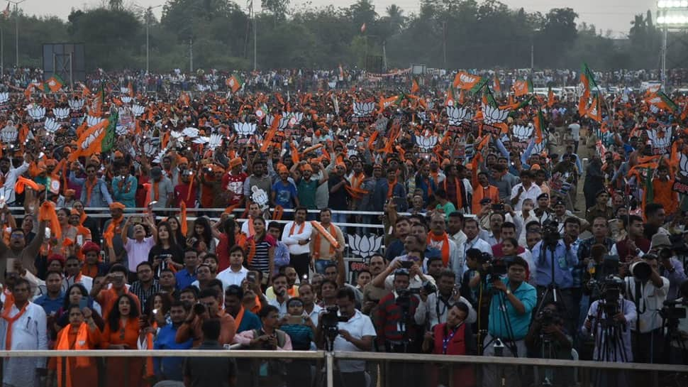 BJP reaches 100 mark in Gujarat with support of Congress rebel