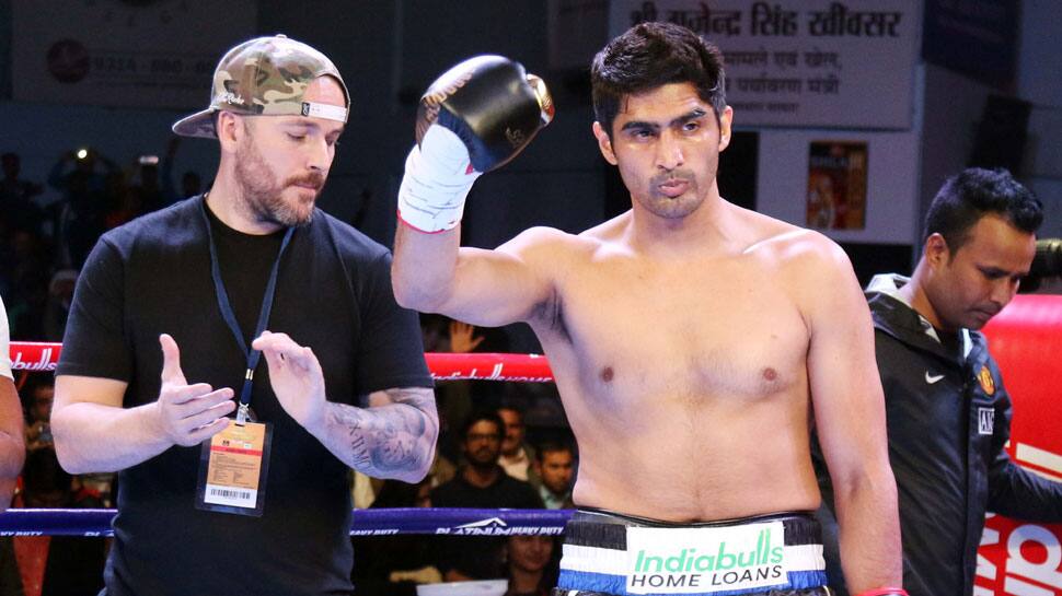 Vijender Singh defends two pro-boxing titles with 10th straight win