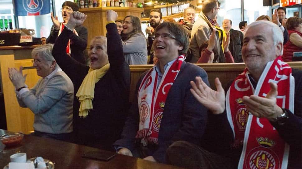 Carles Puigdemont mulls whether to return to Catalonia after win