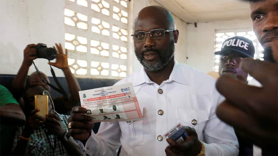 Ex-footballer, vice-president contend in Liberia leadership vote