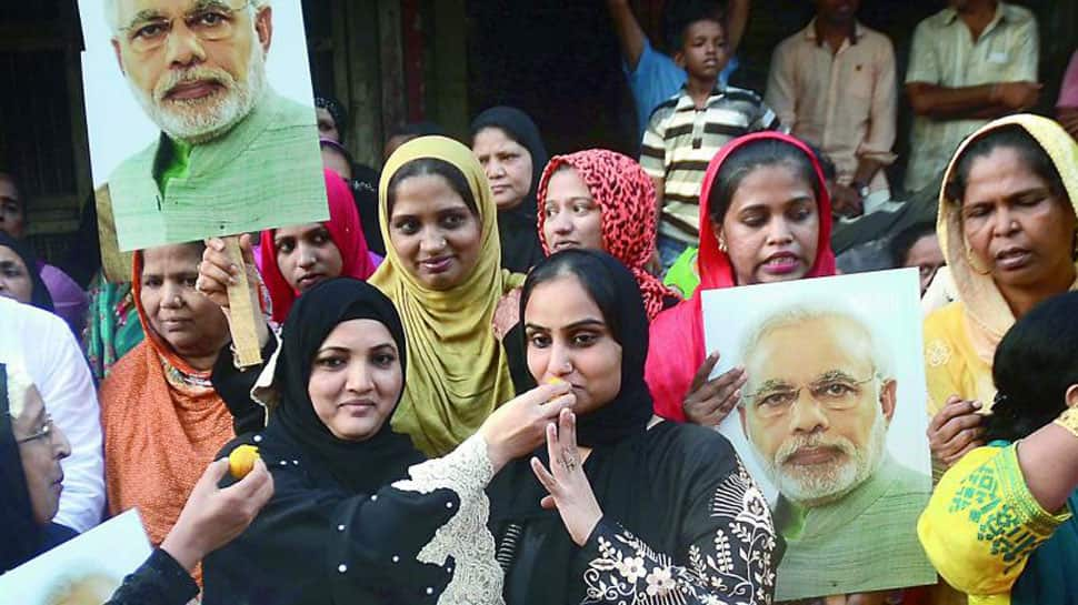 Muslim women exchange sweets, celebrate &#039;Eid&#039; as triple talaq bill gets tabled in Parliament