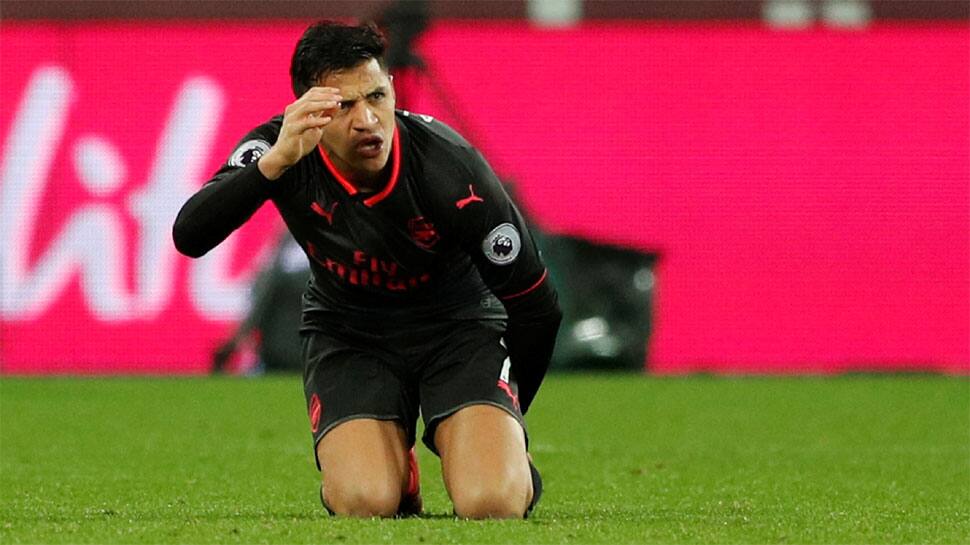 EPL: Alexis Sanchez brace gives Arsenal win on Arsene Wenger&#039;s record-equalling day