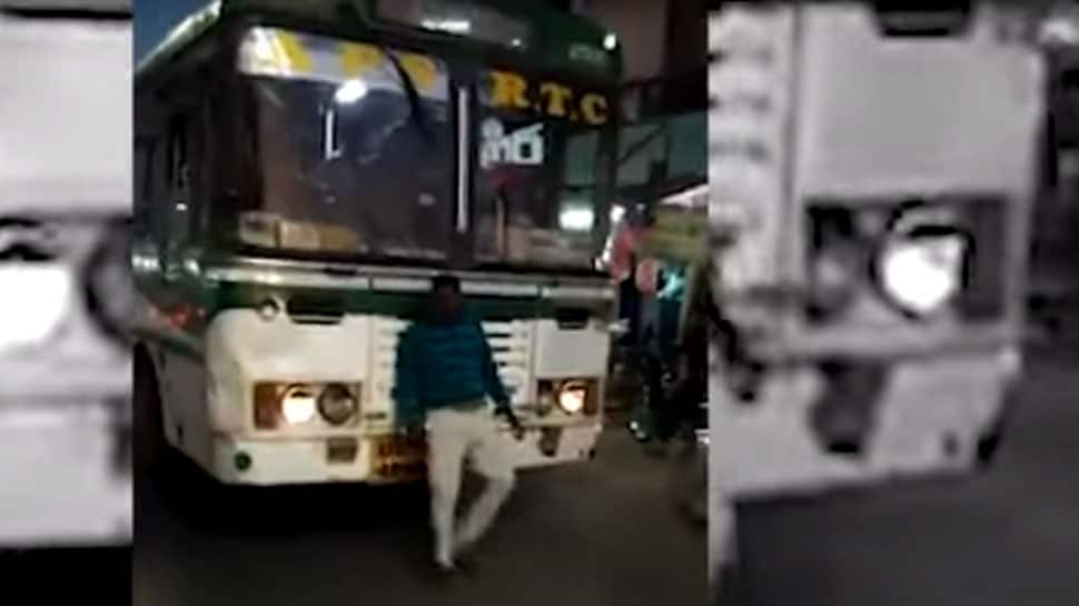 WATCH: Drunken man tries to stop bus in Andhra&#039;s Kurnool