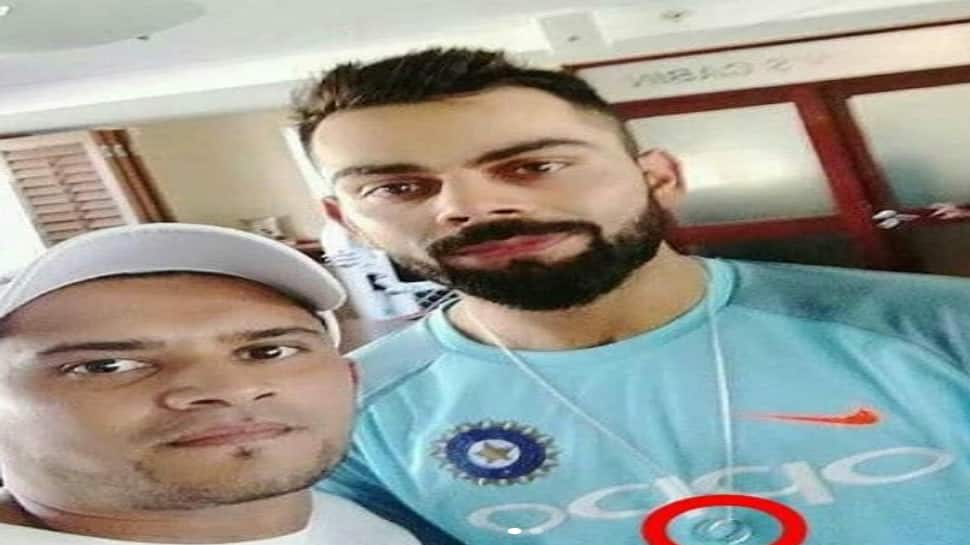 Virat Kohli spotted wearing a wedding ring on his neck?