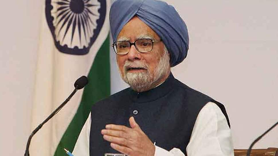 Happy you stand vindicated in 2G case: Manmohan Singh to A Raja