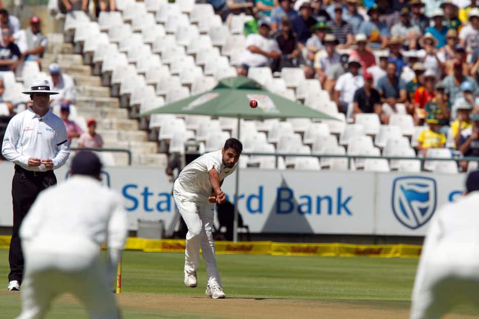 Indian fast bowler Bhuvneshwar Kumar in action during the Ist day of the first cricket test match at Newlands Stadium in Cape Town, South Africa.