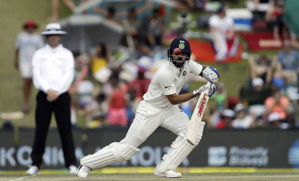 India's captain Virat Kohli watches his shot during the second day of the second cricket test match between South Africa and India at Centurion Park in Pretoria, South Africa.