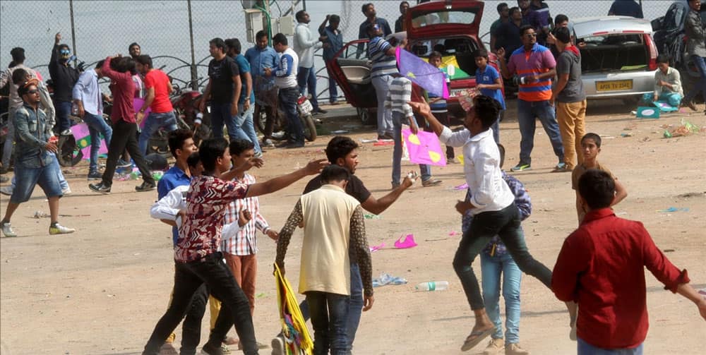 People fly kites on Makar Sankranti in Hyderabad.