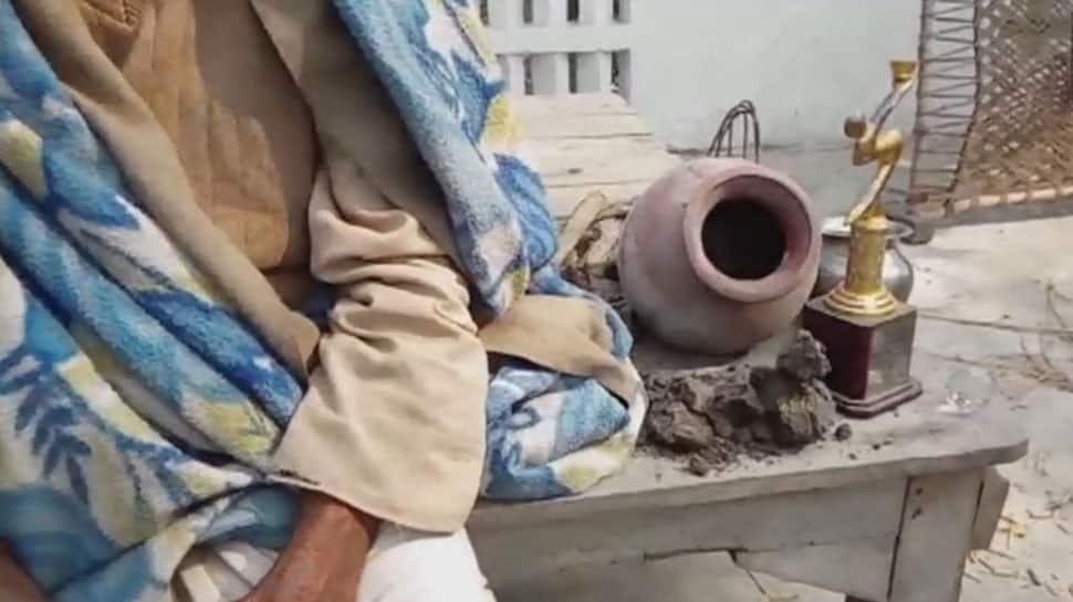 Meet the 100-year-old man who can't survive without eating mud Meet the 100-year-old man who can't survive without eating mud