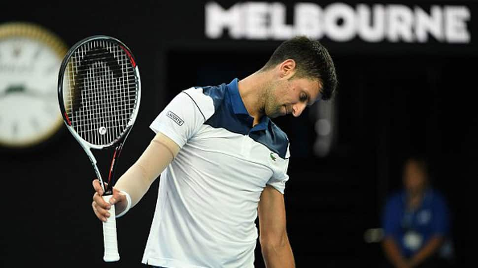 Australian Open: Struggling Novak Djokovic out but Roger Federer into quarters