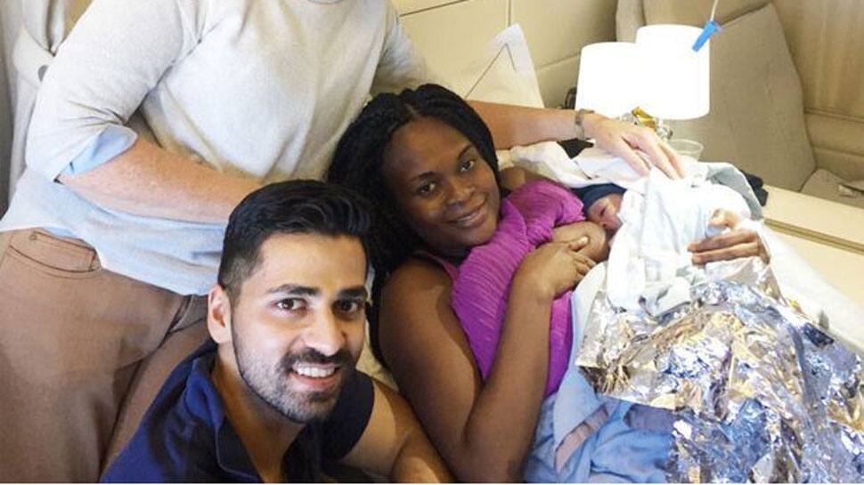 Indian-origin doctor delivers baby 35,000 feet in air