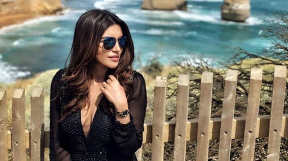 Shama Sikander meditates for &#039;peace&#039; but it&#039;s her red bikini which grabs attention