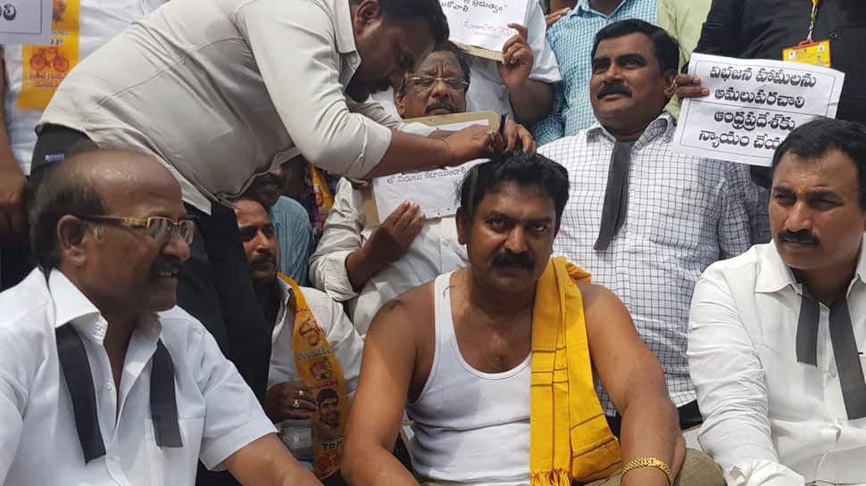 Miffed over budget allocation for Andhra, TDP MLA Bode Prasad gets head tonsured