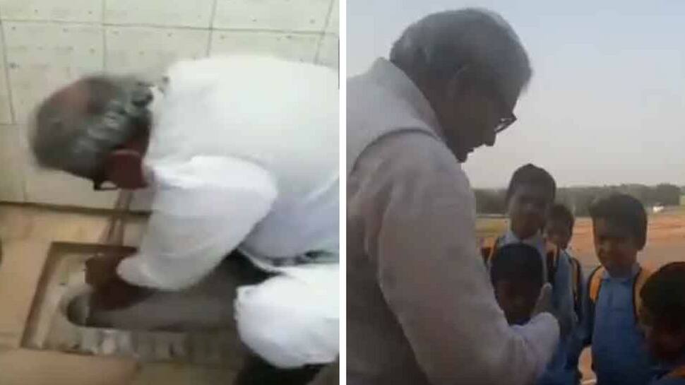 BJP MLA cleans toilet seat with bare hands, cuts students&#039; nails as part of Swachh Bharat mission - Watch